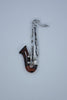 Baltic Amber & Sterling Silver Saxophone Brooch.